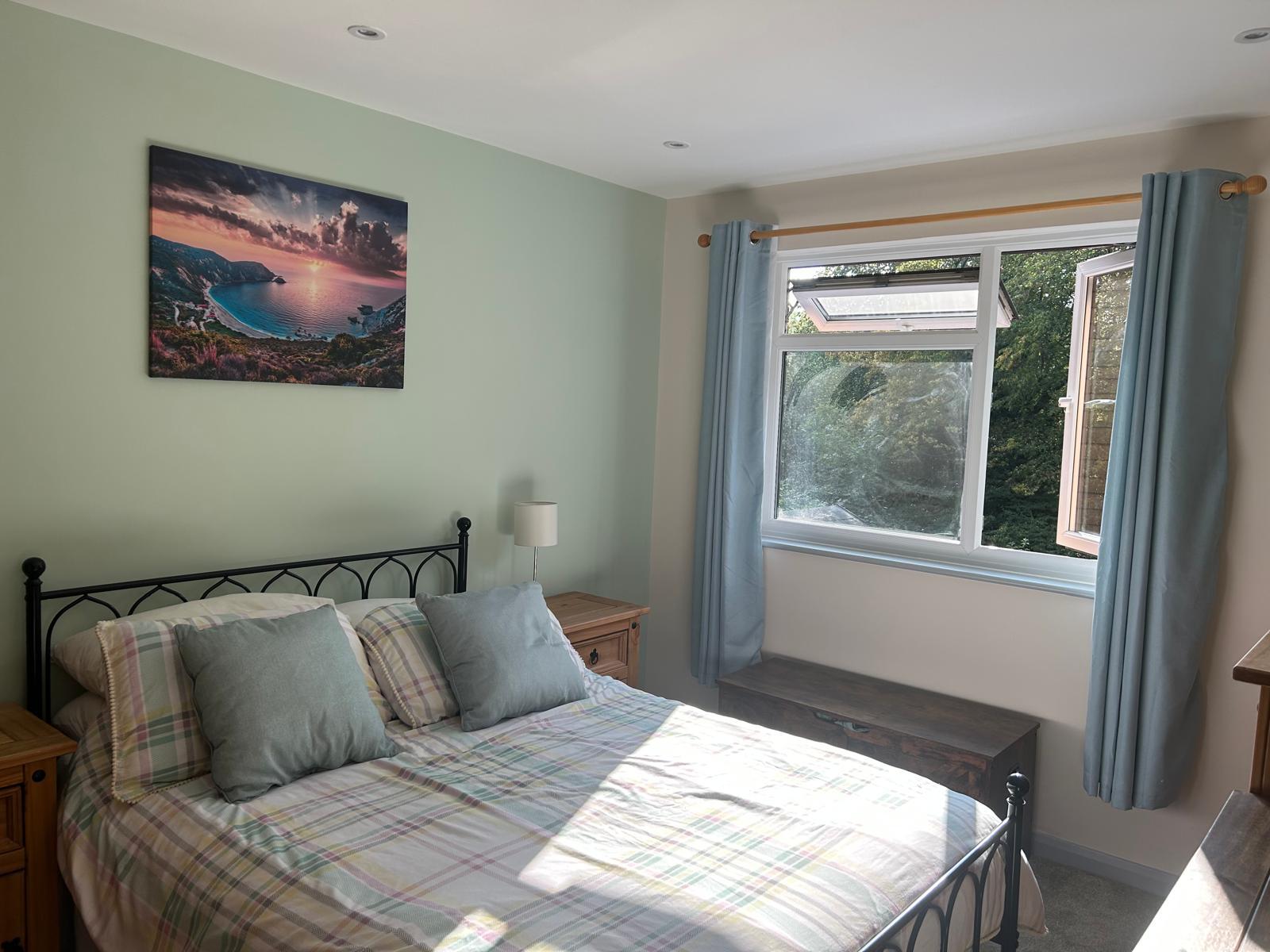 Fully refurbished bedroom with fresh decoration and new flooring