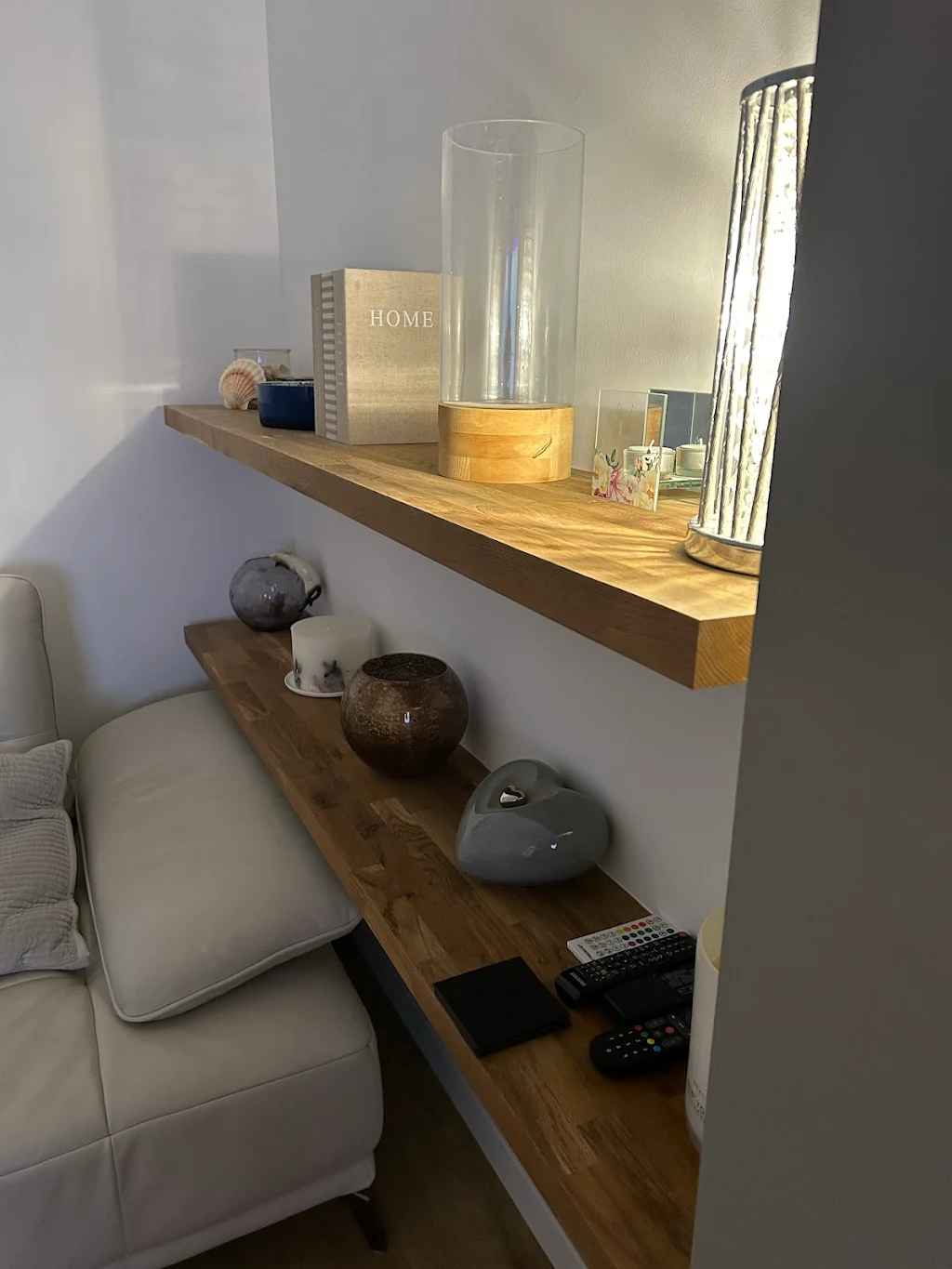 Wooden floating shelf with home decor