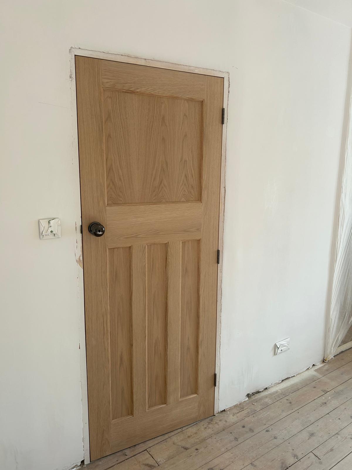 Hardwood door with bespoke handle and ironmongery