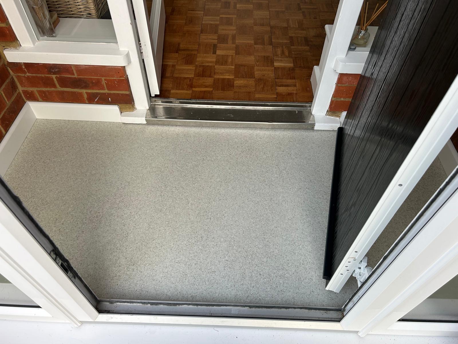 Refurbished porch with new flooring