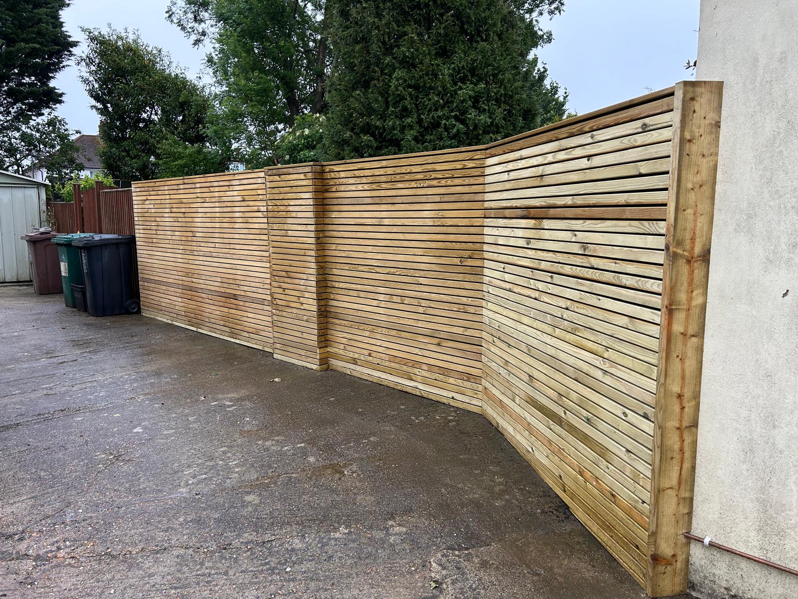 Contemporary horizontal slatted fence